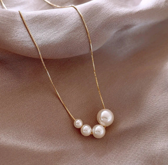 Four Pearl Necklace